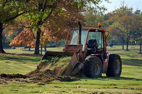 removing sod with a skid steer|soil sod removal.